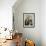 A Family from the Quake-Affected Rangwad Village Sits Near a Fireplace-null-Framed Photographic Print displayed on a wall