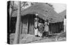 A Family in Front of their Home, Gambia, 20th Century-null-Stretched Canvas