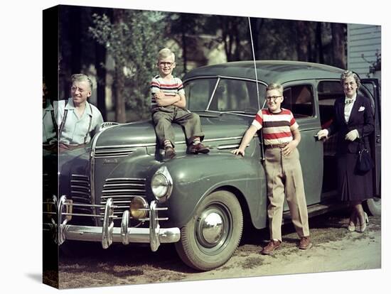 A Family Poses on and around their Plymouth Automobile, Ca. 1953-null-Stretched Canvas