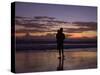 A Father and Son Enjoy Sunset by a Beach-null-Stretched Canvas