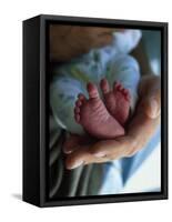 A Father Holding His Baby's Feet-Mitch Diamond-Framed Stretched Canvas
