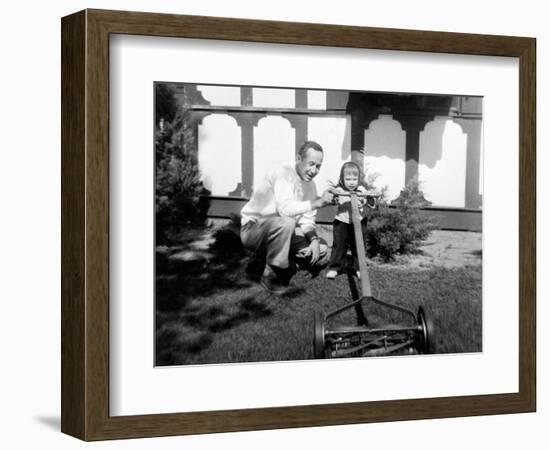 A Father Show His Two Year Old Daughter How to Mow the Lawn, Ca. 1956-null-Framed Photographic Print