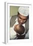 A Father Whispers the Opening Words of the Muslim Shahada in His Newborn Baby's Ear-null-Framed Photographic Print