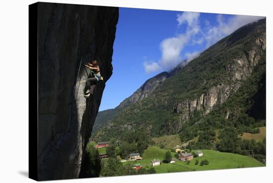 A Female Climber Tackles a Steep Cliff at Loven, Near Aurland, Western Norway, Scandinavia, Europe-David Pickford-Stretched Canvas