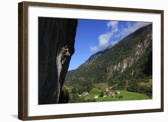 A Female Climber Tackles a Steep Cliff at Loven, Near Aurland, Western Norway, Scandinavia, Europe-David Pickford-Framed Photographic Print