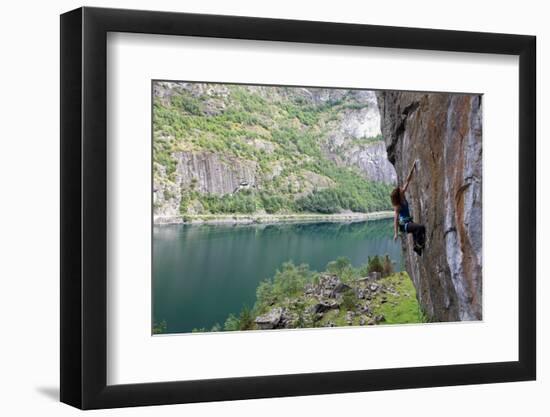 A Female Climber Tackles a Steep Cliff at Loven, Near Aurland, Western Norway, Scandinavia, Europe-David Pickford-Framed Photographic Print