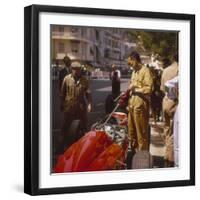 A Ferrari Team Member Filling a Car with Fuel, Monaco Grand Prix, Monte Carlo, 1963-null-Framed Premium Photographic Print