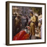 A Ferrari Team Member Filling a Car with Fuel, Monaco Grand Prix, Monte Carlo, 1963-null-Framed Photographic Print