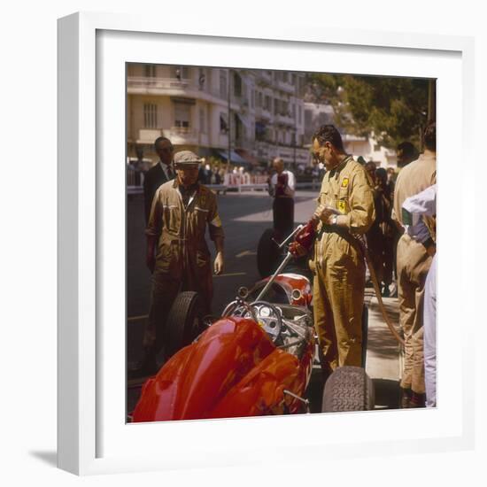 A Ferrari Team Member Filling a Car with Fuel, Monaco Grand Prix, Monte Carlo, 1963-null-Framed Photographic Print
