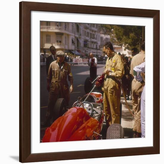 A Ferrari Team Member Filling a Car with Fuel, Monaco Grand Prix, Monte Carlo, 1963-null-Framed Photographic Print