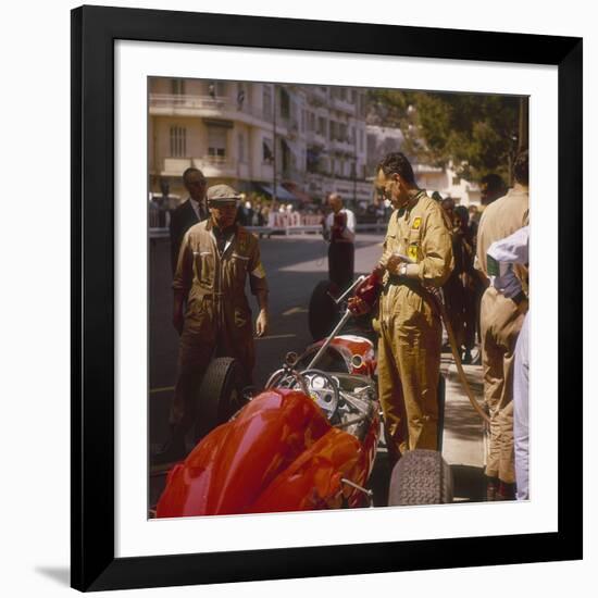 A Ferrari Team Member Filling a Car with Fuel, Monaco Grand Prix, Monte Carlo, 1963-null-Framed Photographic Print