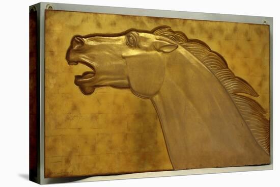 A fine golden lacquered and carved panel deeply carved in intaglio with the head of a stallion-Jean Dunand-Stretched Canvas