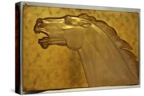 A fine golden lacquered and carved panel deeply carved in intaglio with the head of a stallion-Jean Dunand-Stretched Canvas