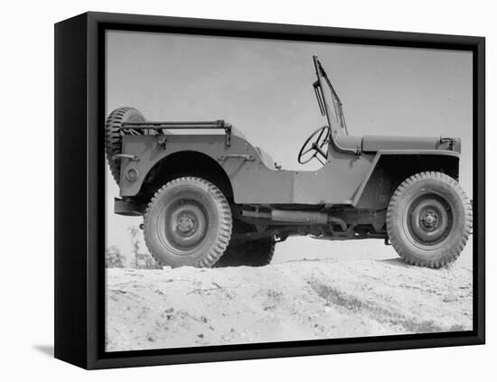 A Finished Jeep Sitting Alone-null-Framed Stretched Canvas