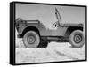 A Finished Jeep Sitting Alone-null-Framed Stretched Canvas