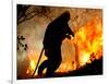 A Fire Fighter Retreats from a Forest Fire Near Fraldeu, Central Portugal-null-Framed Photographic Print