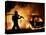 A Firefighter Extinguishes a Car in Les Musicians-null-Stretched Canvas