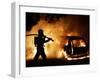 A Firefighter Extinguishes a Car in Les Musicians-null-Framed Premium Photographic Print