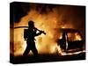 A Firefighter Extinguishes a Car in Les Musicians-null-Stretched Canvas