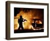 A Firefighter Extinguishes a Car in Les Musicians-null-Framed Photographic Print