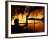 A Firefighter Tries to Extinguish a Raging Fire-null-Framed Photographic Print