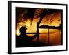 A Firefighter Tries to Extinguish a Raging Fire-null-Framed Photographic Print