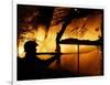 A Firefighter Tries to Extinguish a Raging Fire-null-Framed Photographic Print