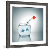 A Fishbowl With A Red Fish Jumping Out Of The Water-magann-Framed Photographic Print