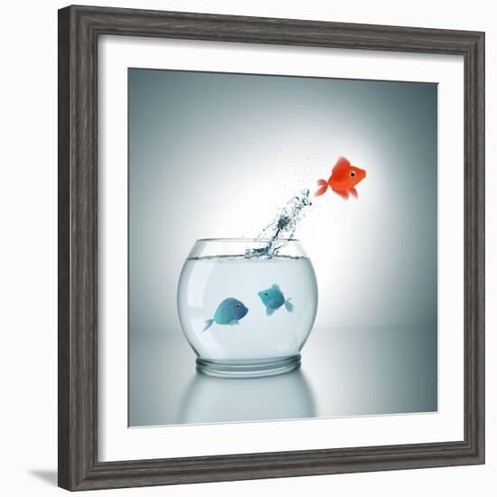 A Fishbowl With A Red Fish Jumping Out Of The Water-magann-Framed Photographic Print