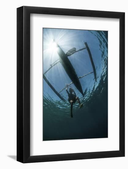 A Fisherman Uses a Wooden Outrigger Near a Remote Island in Indonesia-Stocktrek Images-Framed Photographic Print