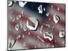 A Flag at a Lawrence, Kan., Restaurant is Refracted in Rain Drops on a Car Window-null-Mounted Photographic Print