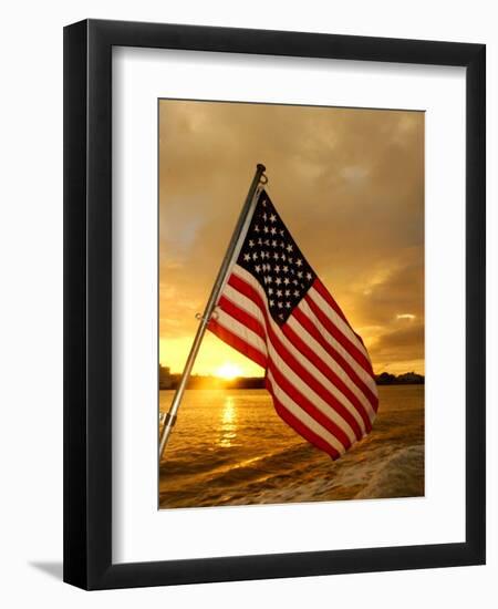 A Flag Waves Over Pearl Harbor as Dawn Breaks-null-Framed Photographic Print