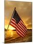A Flag Waves Over Pearl Harbor as Dawn Breaks-null-Mounted Photographic Print