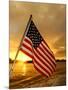 A Flag Waves Over Pearl Harbor as Dawn Breaks-null-Mounted Photographic Print