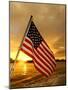 A Flag Waves Over Pearl Harbor as Dawn Breaks-null-Mounted Photographic Print