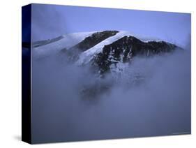 A Foggy Look at Mountain Summit, Kilimanjaro-Michael Brown-Stretched Canvas