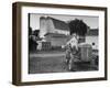 A Ford Tractor Being Sold During the Farmhouse Auction-null-Framed Photographic Print