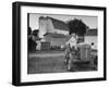 A Ford Tractor Being Sold During the Farmhouse Auction-null-Framed Photographic Print