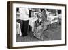 A Foreign Tourist Wearing An Odd Straw Hat-null-Framed Giclee Print