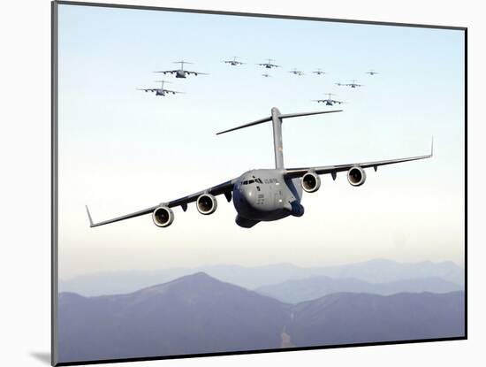 A Formation of 17 C-17 Globemaster IIIs Fly Over the Blue Ridge Mountains-Stocktrek Images-Mounted Photographic Print