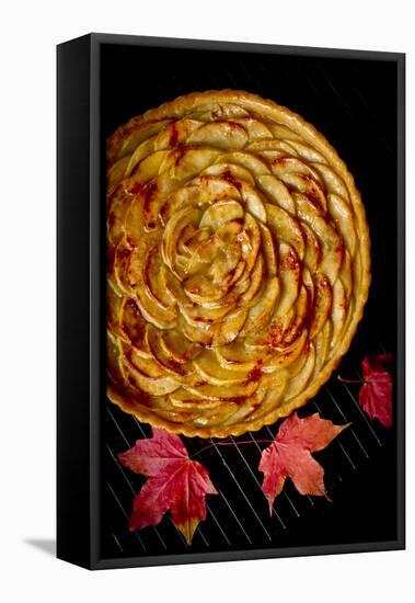 A Fresh Baked French Apple Tart with Colorful Fall Leaves Placed on a Cooling Rack-Cynthia Classen-Framed Stretched Canvas