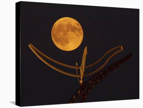 A Full Corn Moon Rises Above a Large Metal Sculpture on the Campus of the University of Minnesota-null-Stretched Canvas