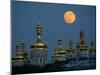 A Full Moon Rises in the Night Sky During a Lunar Eclipse-null-Mounted Photographic Print