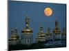 A Full Moon Rises in the Night Sky During a Lunar Eclipse-null-Mounted Photographic Print