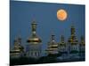 A Full Moon Rises in the Night Sky During a Lunar Eclipse-null-Mounted Photographic Print