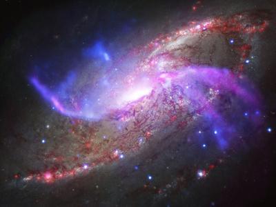 https://imgc.allpostersimages.com/img/posters/a-galactic-light-show-in-spiral-galaxy-ngc-4258_u-L-PRRMYD0.jpg?artPerspective=n