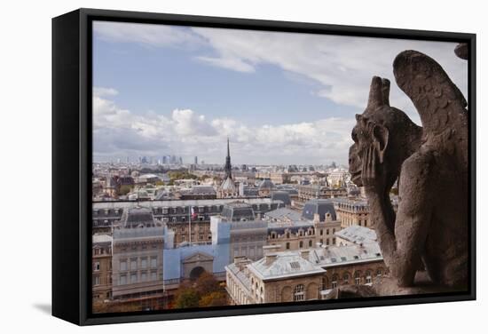 A Gargoyle Stares Out from Notre Dame De Paris Cathedral, Paris, France, Europe-Julian Elliott-Framed Stretched Canvas