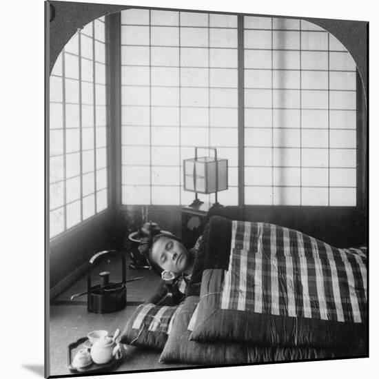 A Geisha Sleeping in a Tea House, Hikone, Japan, 1904-Underwood & Underwood-Mounted Photographic Print