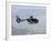 A Gendarme Helicopter is Seen Above the Bay of Cannes-Michel Spingler-Framed Photographic Print