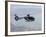 A Gendarme Helicopter is Seen Above the Bay of Cannes-Michel Spingler-Framed Photographic Print